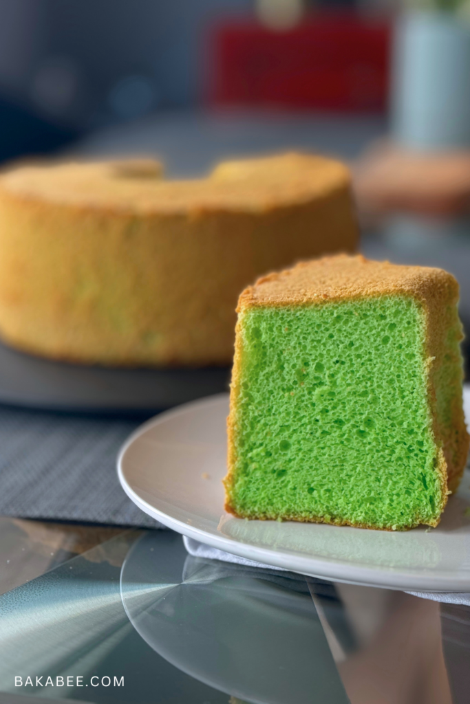 a slice of Pandan Chiffon Cake on a white plate