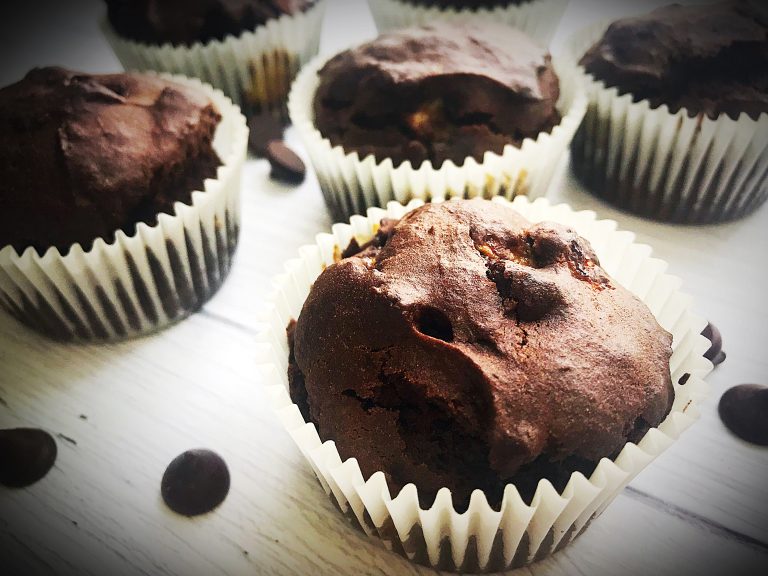 Gluten free and refined sugar free chocolate chip and banana muffins. Rich in chocolate chips and banana chunks.