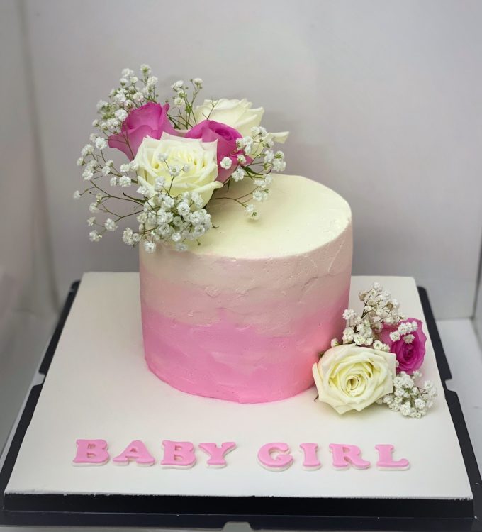Baby shower cake for a girl with fresh flowers decorations customized Singapore