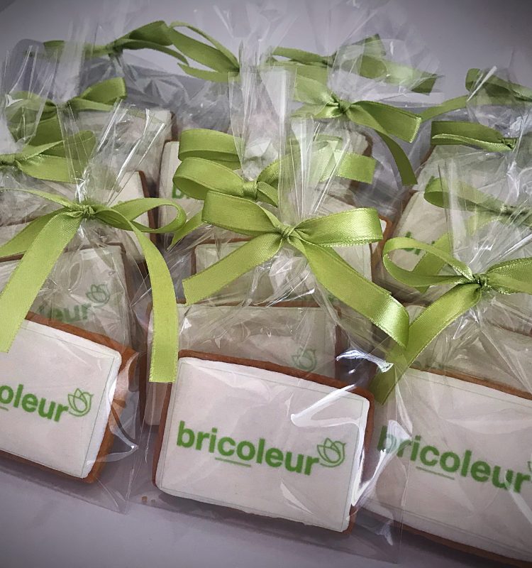 sugar cookie with edible Bricoleur Consulting corporate logo
