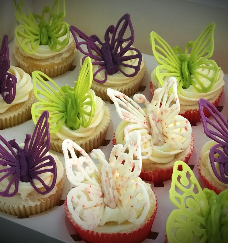 Chocolate or Vanilla cupcakes decorated with edible colourful butterflies